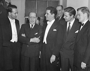 Werner Lywen, Igor Stravinsky, Leonard Bernstein Robert Shaw and other musicians during the intermission of a concert